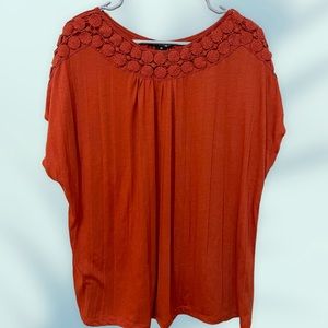 Orange top with details